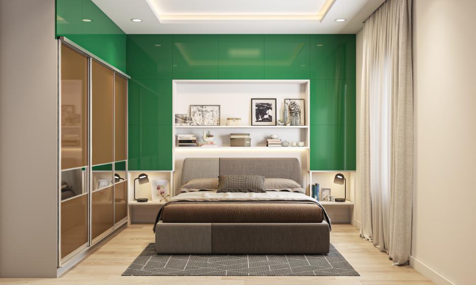 Brown, cream, green bedroom design with warm wood tones and cream bedding.