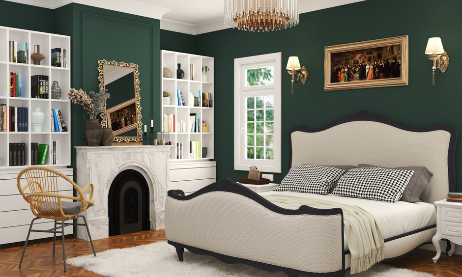 Indian traditional bedroom design with wooden furniture, rich tones, and cultural artefacts.