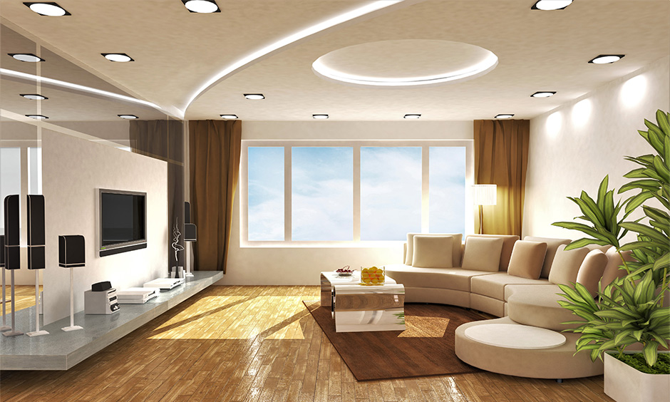 Latest POP ceiling design in a layered style enhances a brown-toned living room's dual spaces.